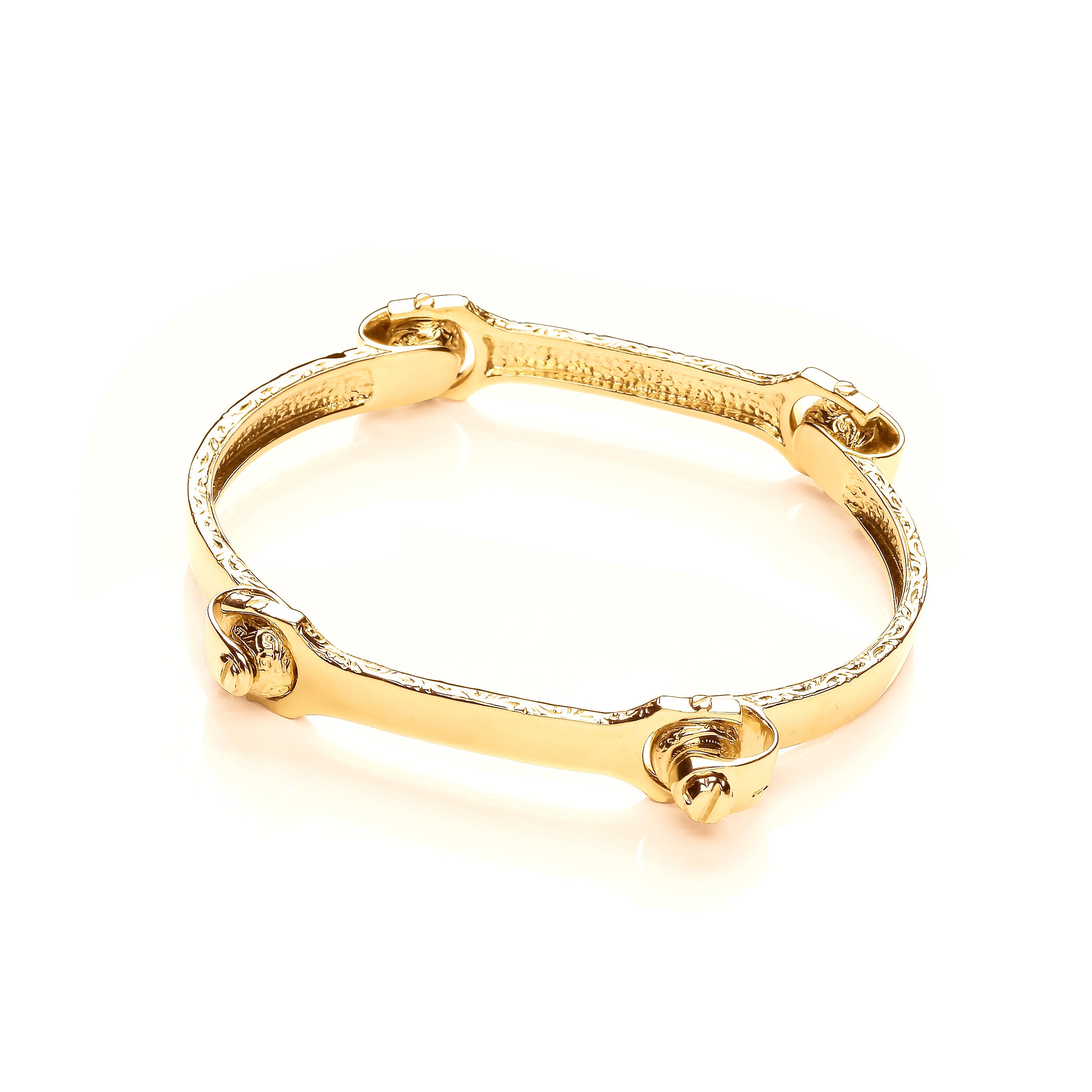 Solid 9ct yellow gold mens bangle with traditional 4-piece bone pattern. Handcrafted in Hatton Garden. Substantial weight, timeless design. Free UK delivery.